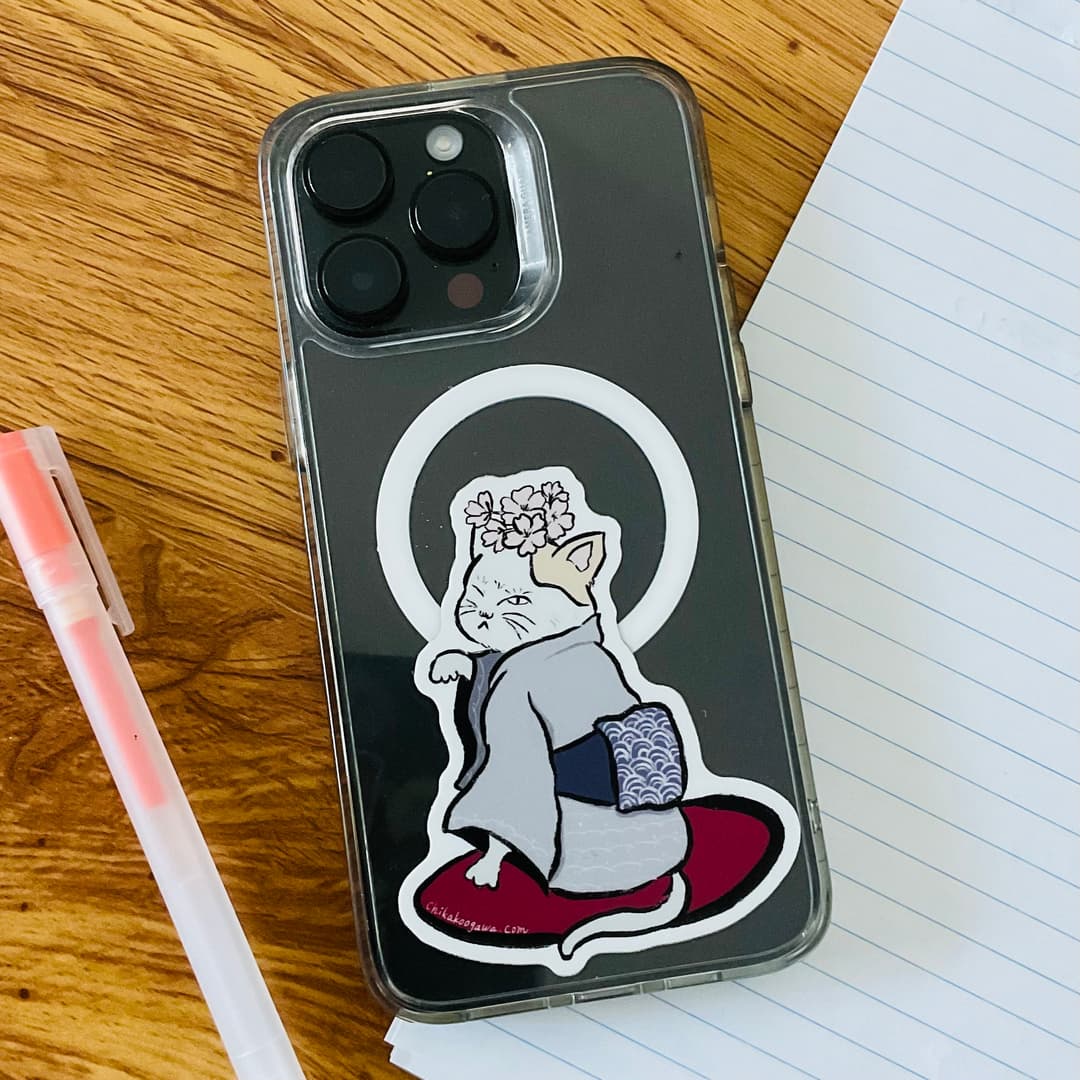 Illustrated phone case sticker of a cat wearing a floral crown and kimono