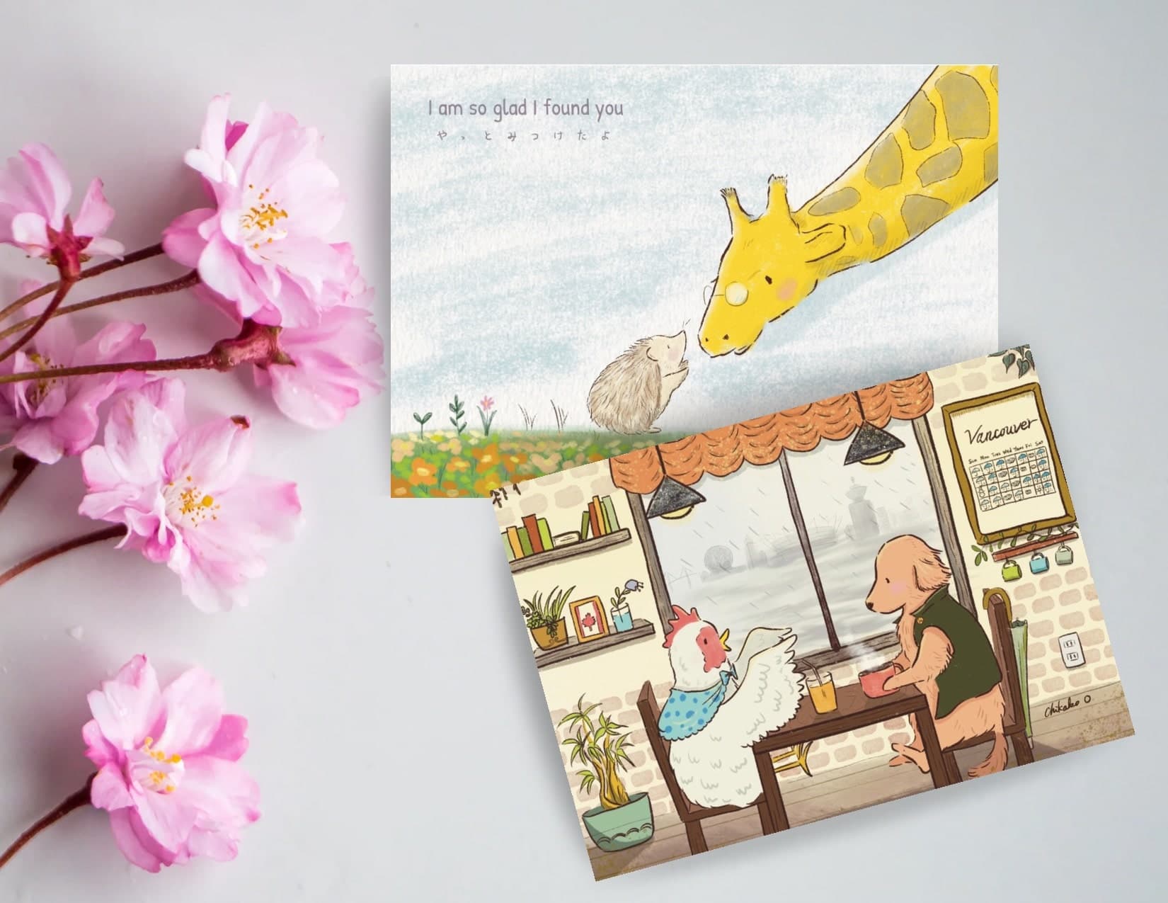 Two illustrated postcards with a flower decoration on the left