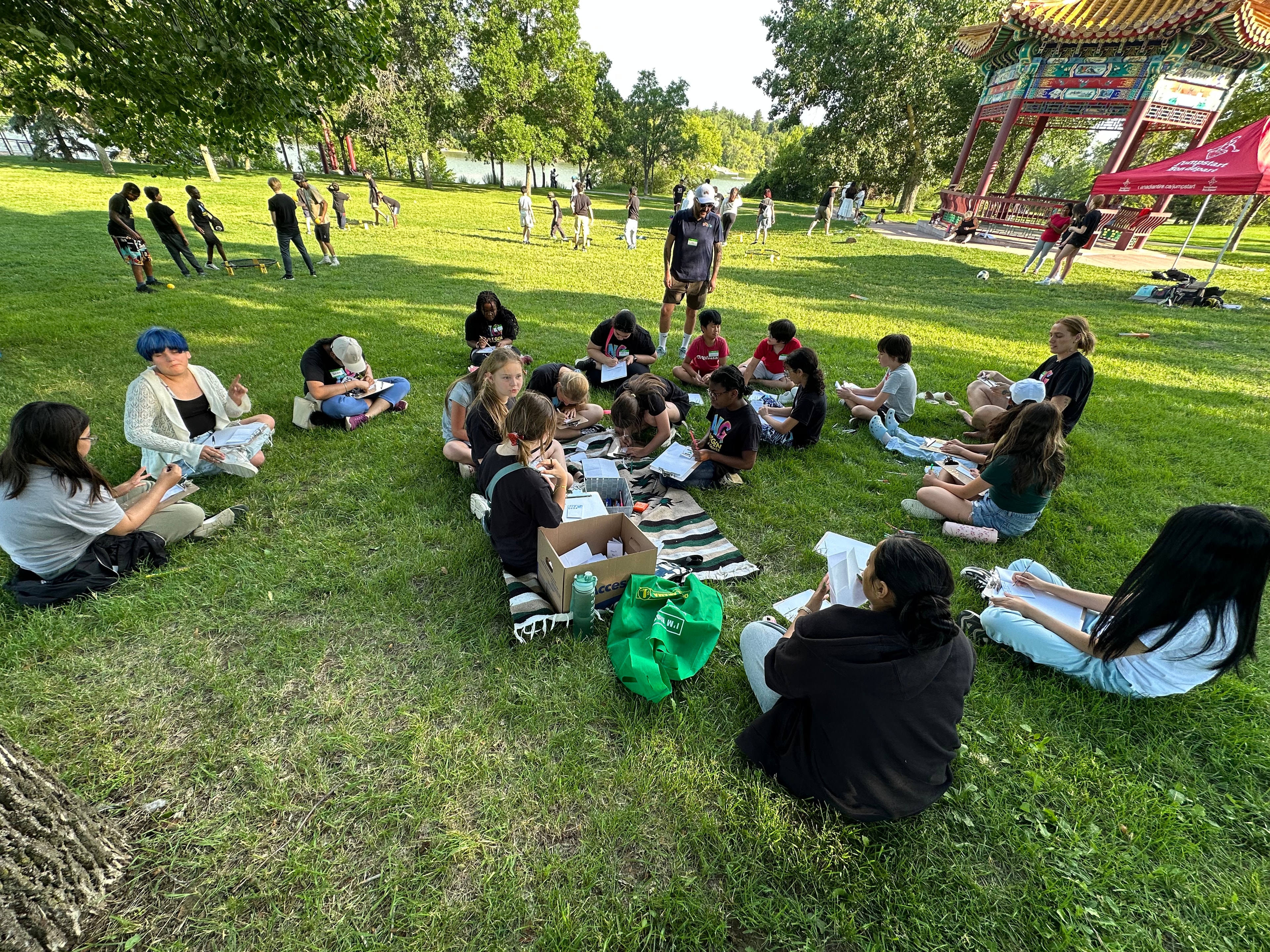 Children participating in a zine-making workshop