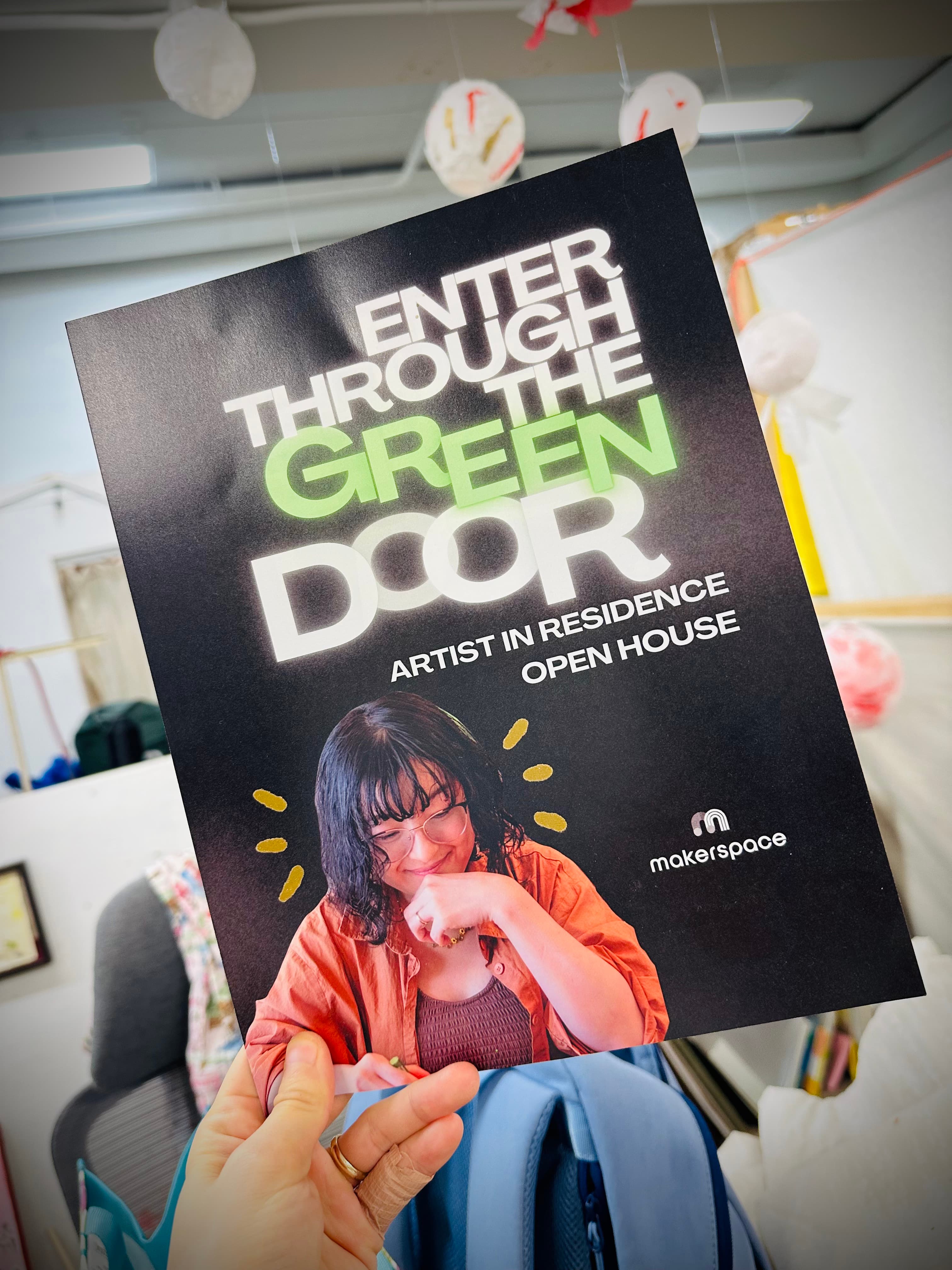 'Enter Through the Green Door' Artist in Residence open house flyer for Makerspace, featuring a photo of Chikako smiling